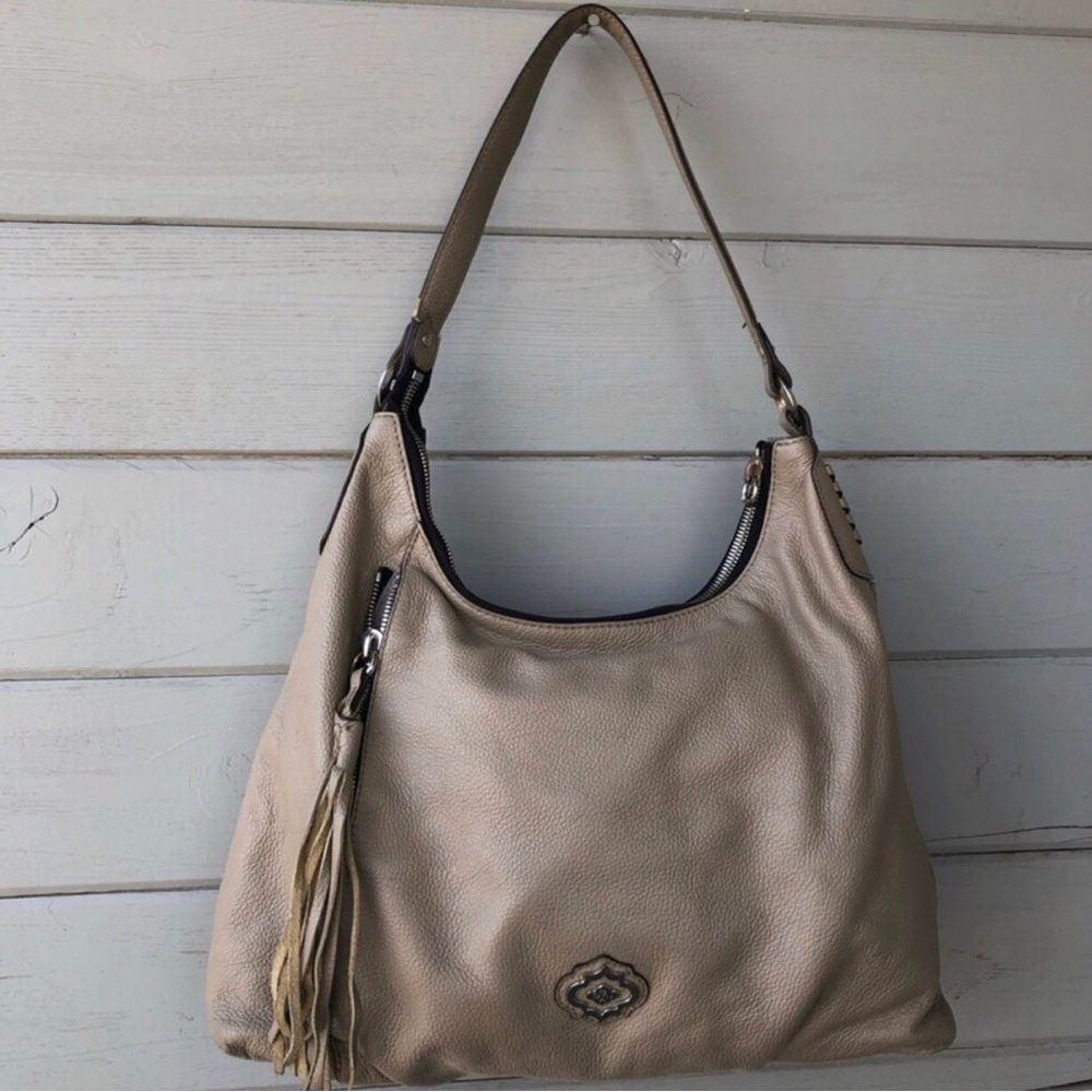 orYANY Taupe Leather Hobo Shoulder Bag with Tassel.